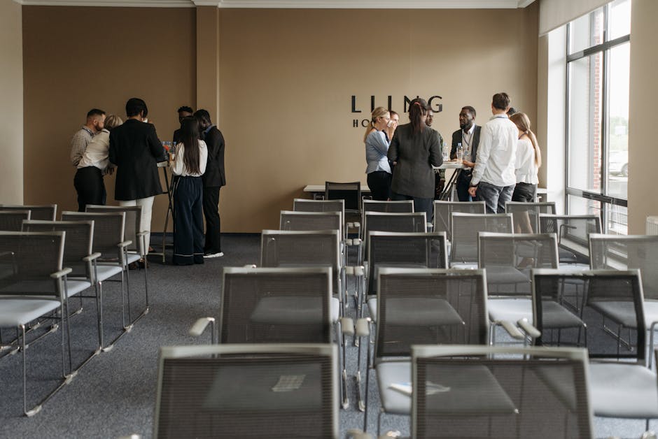Group of participants engaged in a hands-on flower arrangement workshop