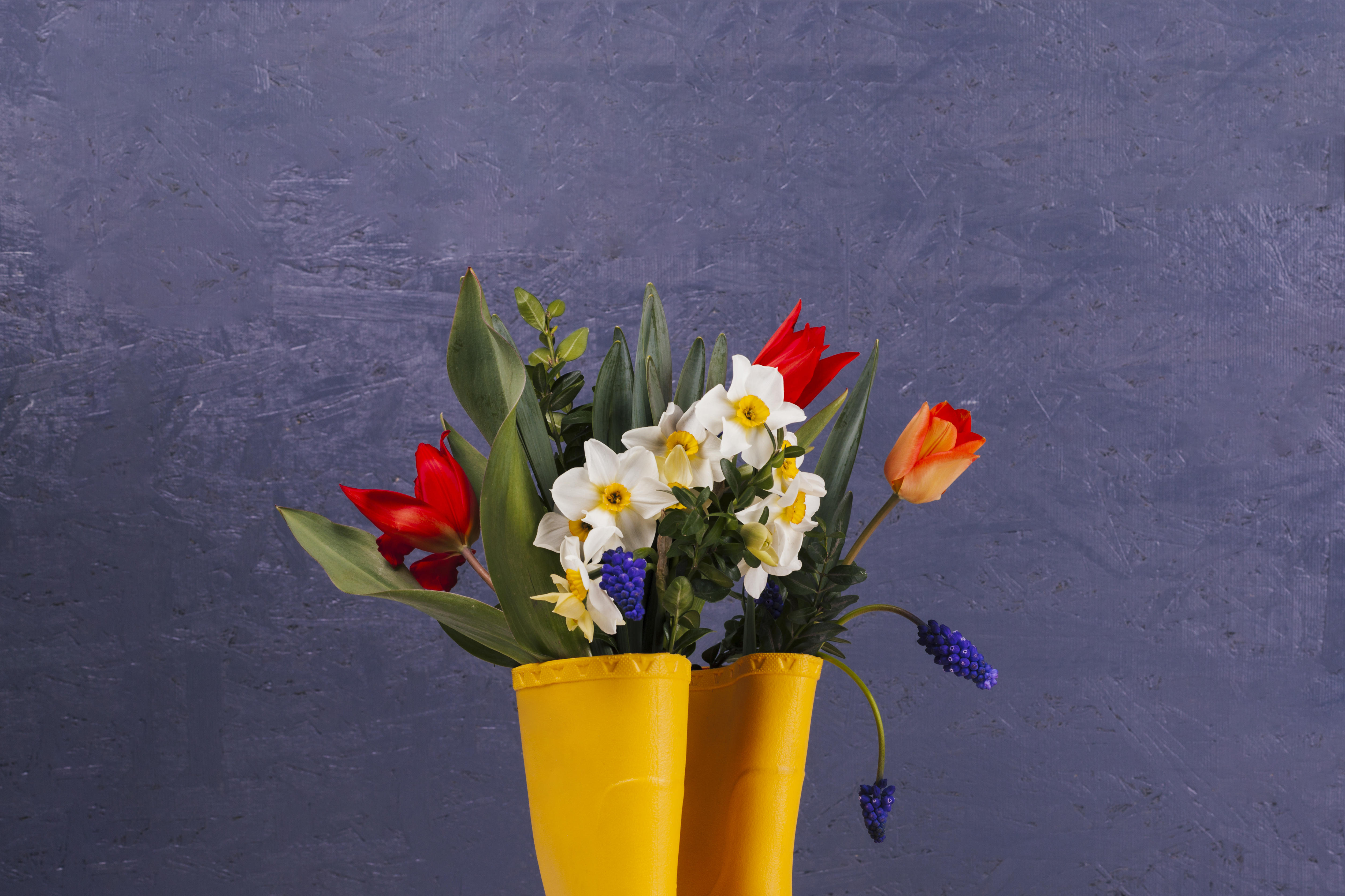 Vibrant bouquet of fresh flowers in a modern vase, suitable for a floral shop hero section
